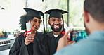 Graduation, students and happy with photography in home with certificate, academic achievement or success. Graduate, man and woman with phone for celebration, social media post or memories in kitchen