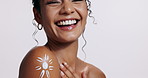 Closeup, woman and cream with skincare, cosmetics and dermatology on a white studio background. Shoulder, person and model with lotion and beauty with shine and glow with wellness and healthy skin
