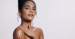 Face, skincare and woman with cream, shine and dermatology on white studio background. Portrait, lotion and model with grooming and beauty with glow and aesthetic with self care, luxury and cosmetics