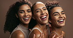 Face, women and group with skincare, smile and dermatology on a brown studio background. Models, laughing and portrait with wellness and dermatology with luxury and funny with healthy skin and beauty