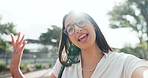 Woman, face and live streaming for social media, website and app with smile and travel in park. Happy, portrait and influencer in the city with video call, holiday and vacation vlog in London