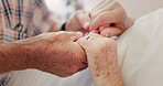 Holding hands, support or old couple in bed with love, connection or bonding with trust in home. Empathy, closeup or elderly people in marriage, house or retirement with commitment, care or affection