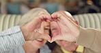 Closeup, heart and senior couple to love, support and partnership as empathy, trust and emoji. Old people, hand and symbol for connection, solidarity and loyalty in commitment, bonding and together