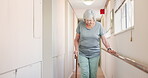 Stick, walking and old woman with a disability in recover or rehabilitation in a clinic for mobility. Healthcare, medical and physiotherapy with a rail elderly female patient alone in a nursing home
