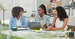 Business women, meeting and designer on laptop for creative ideas, planning and teamwork or collaboration on project. Professional group of people with strategy of social media or website on computer