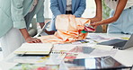 Business people, hands and fashion designer with team with swatches, documents or planning at office. Closeup of creative employees with garment, paperwork and color palette for clothing in startup