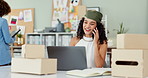 Woman, phone call and boxes with talking in shipping workshop on laptop for supply chain with order. Girl, person and employee at startup business with smartphone, computer and contact with smile