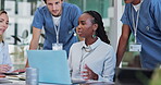 Woman, laptop and medical teamwork with nurse internship in office building for employee training, feedback or research. Female person, collaboration and brainstorming report, results or solution