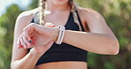 Hands, woman and smartwatch with fitness for time check or navigate route to jog, distance and notification. Runner, exercise and app for healthy living to track progress and updates for results