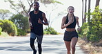 Friends, running and training for marathon on street, cardio and performance for fitness outdoors. People, road and workout challenge for health, support and together for exercise or sports in nature