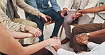 People, holding hands and together at group therapy with support, above or kindness for mental health. Huddle, scrum and empathy with compassion, help and psychology with trust, circle or community