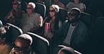 People, laugh and glasses in 3D movie theater with popcorn in crowd, thinking and relax in night with group. Men, women and fast food in cinema for film festival in audience, watch and comedy show