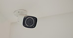 Security, safety and camera in an empty room for surveillance, recording or property recording. Spy, technology and moving lens for property sensor protection system for criminal activity or privacy