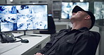 Sleeping, security guard and computer for surveillance, camera and cctv monitor for company safety. Desktop, technology and man in control room with checking system, duty and dashboard in workplace