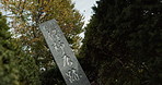 Closeup, garden and a Japanese statue in nature for art, history or culture in the country. Creative, closeup and landscape of a natural environment, sculpture or traditional landmark or monument