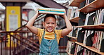 Books, carrying or child in a library walking with smile for knowledge or development for future learning. Scholarship, education or happy student at school studying information to search for a story