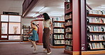 School, tutor or girl in a library dancing with smile for knowledge or development for future learning. Lady teacher, education or happy child student playing with parent, mother or woman on a break