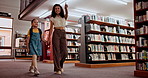School, teacher or kid in a library walking with smile for knowledge or development for future learning. Scholarship, education or student at school ready to start studying or search with a tutor