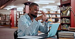 Man, laptop and stress in library for studying research or project deadline for university student, education or scholarship. Black person, glasses and headache pain on campus, paperwork or burnout