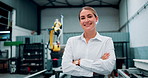 Distribution, warehouse and portrait of woman with arms crossed confidence at supply chain startup. Industry, smile and face of factory worker happy with career pride for shipping, cargo or delivery