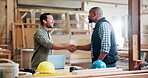 Carpenter, handshake or deal for construction, building and startup collaboration. Handyman, workshop and partnership for manufacturing, agreement or maintenance or renovation with lumber for project