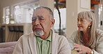 Frustrated, angry and senior couple or disappointment from argument, fight and disagreement with wife. Elderly woman, mature man and couple with diversity in living room, house and retirement home