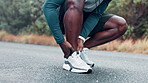 Fitness, ankle and hands rub injury, accident or pain at race, competition or marathon training. Sports, health and closeup of black man athlete with leg muscle sprain for cardio exercise or workout