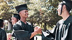 Happy man, students and handshake with certificate for graduation ceremony, education or qualification. Young male person, friends or graduates with smile for diploma, paper or degree outside campus