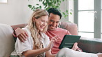 Online, tablet and couple relax in home with streaming, website or scroll social media on vacation. Happy, people and search internet for comedy, movies or funny series to watch on tech on holiday