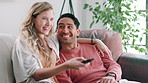 Love, movie or watching tv with couple on sofa in home living room together for subscription entertainment. Smile, television or streaming video with happy young man and woman in apartment to relax