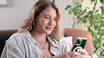 Woman, cellphone and laughing for online social media at home for digital communication, networking or scroll. Female person, sofa and smartphone reading in apartment for relax, search or internet
