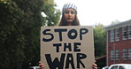 Protest, face and woman with poster for rally to stop war, Palestine conflict and human rights. Demonstration, portrait and muslim girl with cardboard sign for oppression, solidarity and justice