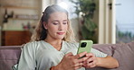 Relax, sofa and woman in home with smartphone for communication, networking and internet connection. Post, message and girl on couch with phone for social media, online chat or checking mobile app  