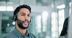 Man, headset or mic in helpdesk, call centre or telemarketing as crm, communication or support. Male consultant, tech or phone to discuss business, sales or advice as happy, telecom or customer care