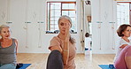 Fitness, yoga and mature women in class for wellness, healthy body and stretching on floor. Retirement, pilates club and elderly people on sports mat for exercise, workout and training together