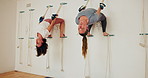 Stretching, women and exercise with rope for yoga or senior group practice iyengar together on a wall in gym class. Fitness, body health and friends with flexibility, wellbeing and wellness at club