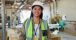 Warehouse, construction and face of woman with smile for industrial career, maintenance and startup. Helmet, employee and portrait of Indonesian engineer for building project, storage and job pride