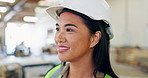 Thinking, smile and Asian woman in a warehouse, factory and engineering with logistics or problem solving. Person, employee or inspection with safety or solution with planning or decision with choice