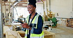 Engineer, warehouse and smartphone of woman with smile for research, networking or update on project. Black person, happy and typing on digital technology for construction, discussion or funny email