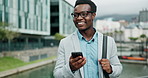 Business travel, phone and black man laughing in a city with social media, meme or funny gif communication. Smartphone, joke or African male entrepreneur in London with app for comic, chat or network