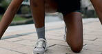 Ready, runner or hands tie shoes to start workout, sports exercise or fitness training for running. Closeup, footwear or healthy person on sidewalk in urban town or city for sprinting or jog in USA