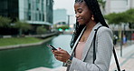 Business, phone and happy black woman in a city with social media, chat or website scroll outdoor. Smartphone, search and African female consultant with app for London travel guide, map or location