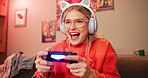 Fun, gen z gamer or controller to play, video game or esports on sofa as excited, virtual challenge. Intense, young woman or couch on tech to focus, solve or level up in online gaming competition