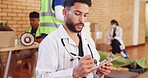 Doctor, worker and man with writing on clipboard for medical schedule, agenda and notes in hall. Healthcare, professional and person with paperwork for information, checklist and community service