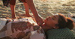 Woman, body and crystal for healing to relax for peace, meditation and calm at beach. Rest, treatment or person with stones for health, wellness or alternative medicine with spiritual hands of shaman
