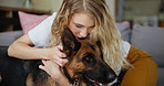 Love, smile or kiss with woman and dog on sofa in living room of home together for pet owner bonding. Hug, trust or relax with happy young person and Alsatian in apartment for care or loyalty