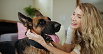 Woman, dog and stroke in home for love connection as animal owner or relax wellness, together or care. Female person, german sheperd and lounge bonding with pet or emotional support, comfort or happy