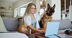 Woman, sofa and dog with computer and glasses at home, emotional support animal for love. Female, couch and German Shepherd with laptop and specs for education, internet or online and connection