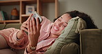 Woman, home and happy on smartphone in bedroom with text messages or social media post and reading good news. Female person, internet and online for content update and laugh with funny video or meme

