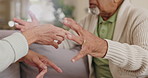 Argument, hands and senior couple on sofa with angry conversation, disagreement and conflict in home. Marriage, old man and frustrated woman on couch with fight, discussion and stress for retirement